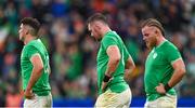 14 October 2023; Ireland players, from left, Jimmy O’Brien, Peter O’Mahony and Finlay Bealham after their side's defeat in the 2023 Rugby World Cup quarter-final match between Ireland and New Zealand at the Stade de France in Paris, France. Photo by Ramsey Cardy/Sportsfile