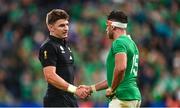 14 October 2023; Hugo Keenan of Ireland and Beauden Barrett of New Zealand shake hands after the 2023 Rugby World Cup quarter-final match between Ireland and New Zealand at the Stade de France in Paris, France. Photo by Ramsey Cardy/Sportsfile