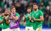 14 October 2023; Iain Henderson of Ireland, right, and teammates after their side's defeat in the 2023 Rugby World Cup quarter-final match between Ireland and New Zealand at the Stade de France in Paris, France. Photo by Ramsey Cardy/Sportsfile
