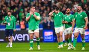 14 October 2023; Tadhg Furlong of Ireland, left, and teammates after their side's defeat in during the 2023 Rugby World Cup quarter-final match between Ireland and New Zealand at the Stade de France in Paris, France. Photo by Ramsey Cardy/Sportsfile