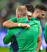 14 October 2023; Hugo Keenan of Ireland, right, is consoled by teammate Keith Earls after their side's defeat in the 2023 Rugby World Cup quarter-final match between Ireland and New Zealand at the Stade de France in Paris, France. Photo by Brendan Moran/Sportsfile