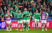 14 October 2023; Iain Henderson of Ireland, centre, and teammates after their side's defeat in the 2023 Rugby World Cup quarter-final match between Ireland and New Zealand at the Stade de France in Paris, France. Photo by Ramsey Cardy/Sportsfile