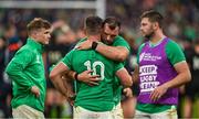 14 October 2023; Tadhg Beirne of Ireland consoles teammate Jonathan Sexton, 10, after their side's defeat in the 2023 Rugby World Cup quarter-final match between Ireland and New Zealand at the Stade de France in Paris, France. Photo by Brendan Moran/Sportsfile
