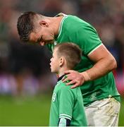 14 October 2023; Jonathan Sexton of Ireland with his son Luca after his side's defeat in the 2023 Rugby World Cup quarter-final match between Ireland and New Zealand at the Stade de France in Paris, France. Photo by Harry Murphy/Sportsfile