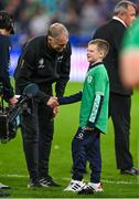 14 October 2023; New Zealand assistant coach Joe Schmidt with Luca Sexton, son of Ireland captain Jonathan Sexton, after the 2023 Rugby World Cup quarter-final match between Ireland and New Zealand at the Stade de France in Paris, France. Photo by Brendan Moran/Sportsfile
