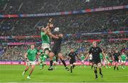 14 October 2023; Peter O’Mahony of Ireland and Richie Mo'unga of New Zealand attempt to catch a kick during the 2023 Rugby World Cup quarter-final match between Ireland and New Zealand at the Stade de France in Paris, France. Photo by Ramsey Cardy/Sportsfile