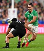 14 October 2023; James Lowe of Ireland in action against Leicester Fainga'anuku of New Zealand during the 2023 Rugby World Cup quarter-final match between Ireland and New Zealand at the Stade de France in Paris, France. Photo by Ramsey Cardy/Sportsfile