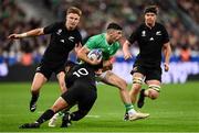 14 October 2023; Jimmy O’Brien of Ireland is tackled by Richie Mo'unga of New Zealand during the 2023 Rugby World Cup quarter-final match between Ireland and New Zealand at the Stade de France in Paris, France. Photo by Ramsey Cardy/Sportsfile