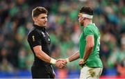 14 October 2023; Hugo Keenan of Ireland and Beauden Barrett of New Zealand shake hands after the 2023 Rugby World Cup quarter-final match between Ireland and New Zealand at the Stade de France in Paris, France. Photo by Ramsey Cardy/Sportsfile