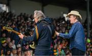15 October 2023; Singer Mundy, right, and bassist Keith Farrell, perform before the Offaly County Senior Club Hurling Championship final match between Kilcormac-Killoughey and Shinrone at Grant Heating St Brendan's Park in Birr, Offaly. Photo by Seb Daly/Sportsfile