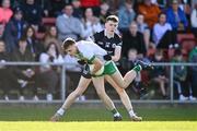 15 October 2023; Ardan McAvoy of Burren in action against Christopher Rooney of Kilcoo during the Down County Senior Club Football Championship final match between Burren and Kilcoo at Pairc Esler in Newry, Down. Photo by Ben McShane/Sportsfile