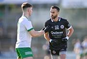 15 October 2023; Conor Laverty of Kilcoo and Peter Fegan of Burren during the Down County Senior Club Football Championship final match between Burren and Kilcoo at Pairc Esler in Newry, Down. Photo by Ben McShane/Sportsfile
