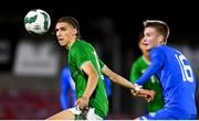 14 October 2023; Niall McAndrews of Republic of Ireland in action against Robert Elis Hlynsson of Iceland during the UEFA European U17 Championship qualifying round 10 match between Republic of Ireland and Iceland at Turner's Cross in Cork. Photo by Eóin Noonan/Sportsfile