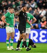14 October 2023; Rieko Ioane of New Zealand celebrates next to Garry Ringrose, left, and Jonathan Sexton of Ireland at the final whistle of the 2023 Rugby World Cup quarter-final match between Ireland and New Zealand at the Stade de France in Paris, France. Photo by Brendan Moran/Sportsfile