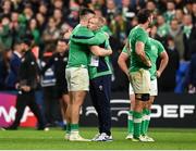 14 October 2023; Dan Sheehan and Keith Earls of Ireland embrace after their side's defeat in the 2023 Rugby World Cup quarter-final match between Ireland and New Zealand at the Stade de France in Paris, France. Photo by Harry Murphy/Sportsfile