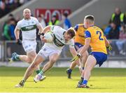 15 October 2023; Kieran Lillis of Portlaoise in action against Jack Lacey of St Joseph's during the Laois County Senior Club Football Championship final match between St Joseph's and Portlaoise at Laois Hire O'Moore Park in Portlaoise, Laois. Photo by Matt Browne/Sportsfile