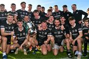 15 October 2023; Kilcoo players celebrate with the cup after the Down County Senior Club Football Championship final match between Burren and Kilcoo at Pairc Esler in Newry, Down. Photo by Ben McShane/Sportsfile