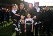 15 October 2023; Kilcoo manager Karl Lacey with, from left, Vee Dunnion, Barry Dunnion, Hayley Dunnion, Lacey Dunnion and Naoise Lacey after the Down County Senior Club Football Championship final match between Burren and Kilcoo at Pairc Esler in Newry, Down. Photo by Ben McShane/Sportsfile