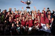 15 October 2023; Ruairí Óg Cushendall players celebrate with the cup after the Antrim County Senior Club Hurling Championship final match between Ruairi Og Cushendall and Loughgiel Shamrocks at Corrigan Park in Belfast. Photo by David Fitzgerald/Sportsfile