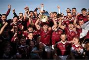 15 October 2023; Ruairí Óg Cushendall players celebrate with the cup after the Antrim County Senior Club Hurling Championship final match between Ruairi Og Cushendall and Loughgiel Shamrocks at Corrigan Park in Belfast. Photo by David Fitzgerald/Sportsfile