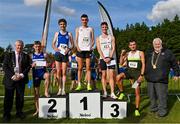 15 October 2023; Senior men's 8000m top finishers, Keelan Kilrehill of Moy Valley AC, Mayo. first, Pierre Murchan of Dublin City Harriers AC, second, Finley Daly of Sligo AC, third, Sean McGinley of Finn Valley AC, Donegal, fourth, Sebastian Nowicki of Poland, fifth, alongside Cllr Tom Kitt, left, and Athletics Ireland President John Cronin, right, during the Autumn Open International Cross Country Festival & The Athletics Ireland Cross County Xperience at Abbotstown in Dublin. Photo by Sam Barnes/Sportsfile