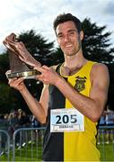 15 October 2023; Eoin Everard of Kilkenny City Harriers AC, with the Jim McNamara trophy after winning the master men's 8000m during the Autumn Open International Cross Country Festival & The Athletics Ireland Cross County Xperience at Abbotstown in Dublin. Photo by Sam Barnes/Sportsfile