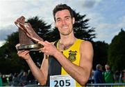 15 October 2023; Eoin Everard of Kilkenny City Harriers AC, with the Jim McNamara trophy after winning the master men's 8000m during the Autumn Open International Cross Country Festival & The Athletics Ireland Cross County Xperience at Abbotstown in Dublin. Photo by Sam Barnes/Sportsfile