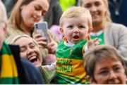 15 October 2023; A young Kilcormac-Killoughey supporter celebrates after the Offaly County Senior Club Hurling Championship final match between Kilcormac-Killoughey and Shinrone at Grant Heating St Brendan's Park in Birr, Offaly. Photo by Seb Daly/Sportsfile