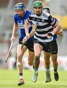 15 October 2023; Ross O'Regan of Midleton in action against Cian Darcy of Sarsfields during the Cork County Premier Senior Club Hurling Championship final between Sarsfields and Midleton at Páirc Uí Chaoimh in Cork. Photo by Eóin Noonan/Sportsfile