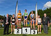 15 October 2023; Senior women's 6000m top finishers Ide Nic Dhomhnaill of West Limerick AC, first, Louise Shanahan of Leevale AC, Cork, second, Nadine Donegan of Tullamore Harriers AC, Offaly, third, Nakita Burke of Letterkenny AC, Donegal, fourth, and Aoife O'Cuill of St Coca's AC, Kildare, fifth, with Cllr Tom Kitt, left, and Athletics Ireland President John Cronin during the Autumn Open International Cross Country Festival & The Athletics Ireland Cross County Xperience at Abbotstown in Dublin. Photo by Sam Barnes/Sportsfile