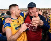 15 October 2023; St Joseph's manager Mick Dempsey celebrates with Michael Keogh after the Laois County Senior Club Football Championship final match between St Joseph's and Portlaoise at Laois Hire O'Moore Park in Portlaoise, Laois. Photo by Matt Browne/Sportsfile