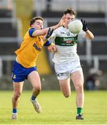 15 October 2023; Conor Raggett of Portlaoise in action against Oisin Hooney of St Joseph's during the Laois County Senior Club Football Championship final match between St Joseph's and Portlaoise at Laois Hire O'Moore Park in Portlaoise, Laois. Photo by Matt Browne/Sportsfile
