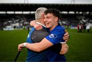 15 October 2023; Colm McCarthy of Sarsfields celebrates with Sarsfields selector Diarmuid O'Sullivan after the Cork County Premier Senior Club Hurling Championship final between Sarsfields and Midleton at Páirc Uí Chaoimh in Cork. Photo by Eóin Noonan/Sportsfile