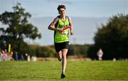15 October 2023; Cillian Flood of Metro St Brigids AC, Dublin, competes in the boys U15 4x1000m relay during the Autumn Open International Cross Country Festival & The Athletics Ireland Cross County Xperience at Abbotstown in Dublin. Photo by Sam Barnes/Sportsfile
