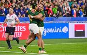 15 October 2023; Kurt-Lee Arendse of South Africa celebrates with team-mate Cobus Reinach during the 2023 Rugby World Cup quarter-final match between France and South Africa at the Stade de France in Paris, France. Photo by Ramsey Cardy/Sportsfile