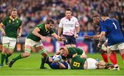 15 October 2023; Eben Etzebeth of South Africa attempts to intercept a pass by Antoine Dupont of France during the 2023 Rugby World Cup quarter-final match between France and South Africa at the Stade de France in Paris, France. Photo by Ramsey Cardy/Sportsfile
