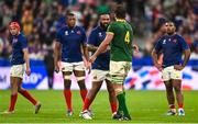 15 October 2023; Eben Etzebeth of South Africa embraces Uini Atonio of France after being shown a yellow card by referee Ben O'Keeffe during the 2023 Rugby World Cup quarter-final match between France and South Africa at the Stade de France in Paris, France. Photo by Harry Murphy/Sportsfile