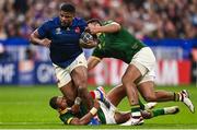 15 October 2023; Jonathan Danty of France is tackled by Manie Libbok and Damian de Allende of South Africa during the 2023 Rugby World Cup quarter-final match between France and South Africa at the Stade de France in Paris, France. Photo by Harry Murphy/Sportsfile