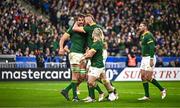 15 October 2023; Eben Etzebeth of South Africa celebrates with team-mate RG Snyman after scoring his side's fourth try during the 2023 Rugby World Cup quarter-final match between France and South Africa at the Stade de France in Paris, France. Photo by Harry Murphy/Sportsfile