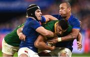 15 October 2023; Damian de Allende of South Africa is tackled by Antoine Dupont, left, and Gael Fickou of France during the 2023 Rugby World Cup quarter-final match between France and South Africa at the Stade de France in Paris, France. Photo by Harry Murphy/Sportsfile