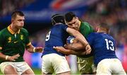 15 October 2023; Damian de Allende of South Africa is tackled by Antoine Dupont, left, and Gael Fickou of France during the 2023 Rugby World Cup quarter-final match between France and South Africa at the Stade de France in Paris, France. Photo by Harry Murphy/Sportsfile