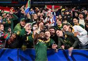 15 October 2023; South Africa captain Siya Kolisi celebrates with supporters after his side's victory in the 2023 Rugby World Cup quarter-final match between France and South Africa at the Stade de France in Paris, France. Photo by Harry Murphy/Sportsfile