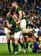 15 October 2023; Eben Etzebeth of South Africa, left, celebrates with teammates Faf de Klerk and RG Snyman after scoring his side's fourth try during the 2023 Rugby World Cup quarter-final match between France and South Africa at the Stade de France in Paris, France. Photo by Harry Murphy/Sportsfile