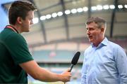 16 October 2023; Republic of Ireland manager Stephen Kenny is interviewed by Kieran Crowley, FAI communications manager, before the UEFA EURO 2024 Championship qualifying group B match between Gibraltar and Republic of Ireland at Estádio Algarve in Faro, Portugal. Photo by Stephen McCarthy/Sportsfile