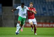 16 October 2023; Chiedozie Ogbene of Republic of Ireland in action against Ethan Britto of Gibraltar during the UEFA EURO 2024 Championship qualifying group B match between Gibraltar and Republic of Ireland at Estádio Algarve in Faro, Portugal. Photo by Stephen McCarthy/Sportsfile