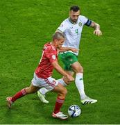 16 October 2023; Tjay De Barr of Gibraltar in action against Shane Duffy of Republic of Ireland during the UEFA EURO 2024 Championship qualifying group B match between Gibraltar and Republic of Ireland at Estádio Algarve in Faro, Portugal. Photo by Seb Daly/Sportsfile