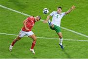 16 October 2023; Josh Cullen of Republic of Ireland in action against Tjay De Barr of Gibraltar during the UEFA EURO 2024 Championship qualifying group B match between Gibraltar and Republic of Ireland at Estádio Algarve in Faro, Portugal. Photo by Seb Daly/Sportsfile