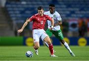 16 October 2023; Jayce Olivero of Gibraltar in action against Chiedozie Ogbene of Republic of Ireland during the UEFA EURO 2024 Championship qualifying group B match between Gibraltar and Republic of Ireland at Estádio Algarve in Faro, Portugal. Photo by Stephen McCarthy/Sportsfile
