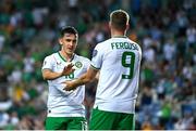 16 October 2023; Evan Ferguson of Republic of Ireland celebrates with teammates Jamie McGrath after scoring their side's first goal during the UEFA EURO 2024 Championship qualifying group B match between Gibraltar and Republic of Ireland at Estádio Algarve in Faro, Portugal. Photo by Stephen McCarthy/Sportsfile