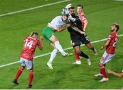 16 October 2023; Gibraltar goalkeeper Dayle Coleing in action against Shane Duffy of Republic of Ireland during the UEFA EURO 2024 Championship qualifying group B match between Gibraltar and Republic of Ireland at Estádio Algarve in Faro, Portugal. Photo by Seb Daly/Sportsfile